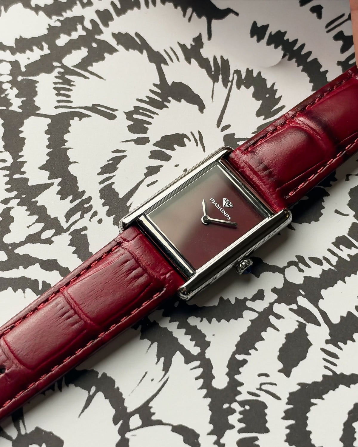 Diamond burgundy dial